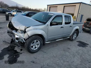 2010 Nissan Frontier LE with VIN 1N6AD0EV1AC401180, listed as a Copart auction lot 83980224 with Not provided miles and Salvage title. Bid and sale history available at DreamBid. Image 1.