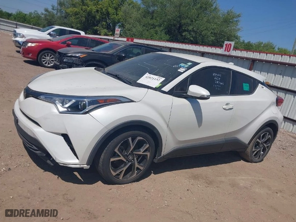 2019 Toyota C-HR XLE with VIN JTNKHMBX7K1023674, listed as a IAAI auction lot 42021152 with 106,450 mi miles. Bid and sale history available at carsss.com. Image 14.