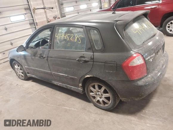 2005 Kia Spectra with VIN KNAFE161255083357, listed as a IAAI auction lot 41445285 with 90,349 mi miles. Bid and sale history available at carsss.com. Image 3.