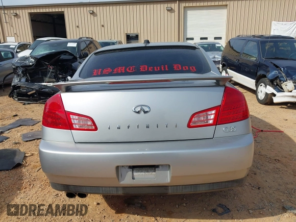 2003 Infiniti G35 z VIN JNKCV51E53M334588, wystawiony jako IAAI lot #41795156 z przebiegiem 99 906 mil mil oraz . Historia ofert i sprzedaży dostępna na DreamBid. Obrazek 16.