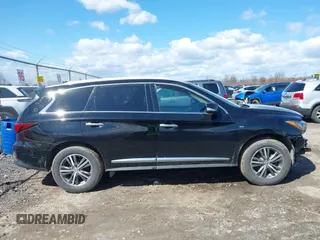 2020 Infiniti QX60 LUXE with VIN 5N1DL0MM9LC502865, listed as a IAAI auction lot 42000744 with 100,359 mi miles. Bid and sale history available at carsss.com. Image 14.