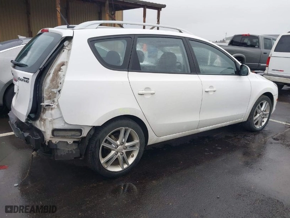 2012 Hyundai Elantra Touring SE with VIN KMHDC8AE2CU146880, listed as a IAAI auction lot 41705022 with 53,870 mi miles. Bid and sale history available at carsss.com. Image 4.