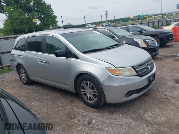2012 Honda Odyssey EX-L with VIN 5FNRL5H66CB081323, listed as a IAAI auction lot 42465110 with 266,934 mi miles and . Bid and sale history available at DreamBid. Image 13.