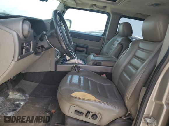 2003 Hummer H2 with VIN 5GRGN23U53H142732, listed as a Copart auction lot 54492145 with 200,324 mi miles and Clean Title. Bid and sale history available at carsss.com. Image 7.
