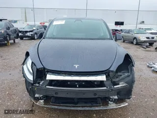2023 Tesla Model Y Long Range with VIN 7SAYGDEEXPA155581, listed as a IAAI auction lot 41434701 with 15,979 mi miles. Bid and sale history available at carsss.com. Image 6.