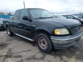 1999 Ford F-150 with VIN 1FTZX1720XKA54784, listed as a IAAI auction lot 41572757 with Not Provided miles and . Bid and sale history available at DreamBid. Image 1.