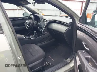 2022 Hyundai Santa Cruz SEL with VIN 5NTJB4AEXNH034989, listed as a IAAI auction lot 42176050 with 27,297 mi miles and . Bid and sale history available at DreamBid. Image 5.