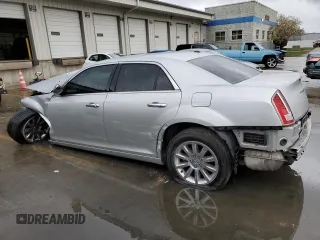 2012 Chrysler 300 with VIN 2C3CCAET5CH288759, listed as a Copart auction lot 83869294 with 100,575 mi miles and Salvage Title. Bid and sale history available at carsss.com. Image 2.