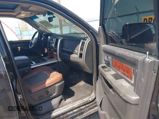 2012 Ram 2500 Laramie Longhorn with VIN 3C6UD5GL8CG182590, listed as a IAAI auction lot 42135638 with 232,377 mi miles and . Bid and sale history available at DreamBid. Image 5.