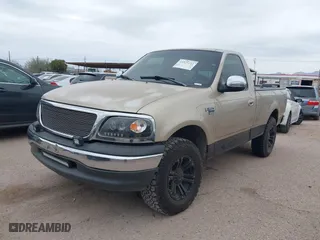 1999 Ford F-150 Work Series with VIN 1FTRF17WXXKA74403, listed as a IAAI auction lot 41525113 with 1 mi miles. Bid and sale history available at carsss.com. Image 2.
