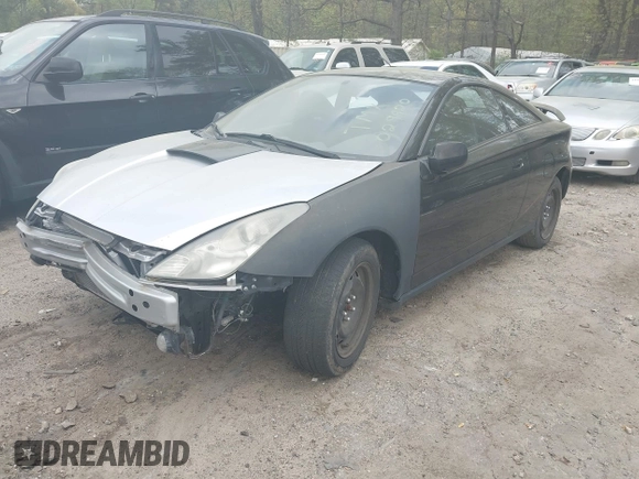 2000 Toyota Celica GT with VIN JTDDR32T4Y0029920, listed as a IAAI auction lot 41944128 with 251,469 mi miles. Bid and sale history available at carsss.com. Image 2.