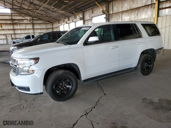 2016 Chevrolet Tahoe Commercial with VIN 1GNLCDEC9GR145324, listed as a Copart auction lot 83371894 with 106,390 mi miles and Salvage Title. Bid and sale history available at carsss.com. Image 1.