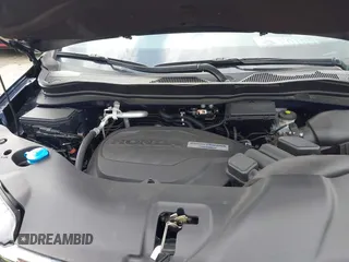 2018 Honda Pilot EX-L with VIN 5FNYF5H5XJB025960, listed as a IAAI auction lot 41843520 with 23,404 mi miles and . Bid and sale history available at DreamBid. Image 10.