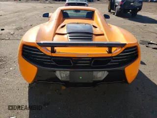 2015 McLaren 650S z VIN SBM11FAA4FW005016, wystawiony jako Copart lot #39770864 z przebiegiem Nie podano mil oraz . Historia ofert i sprzedaży dostępna na DreamBid. Obrazek 6.