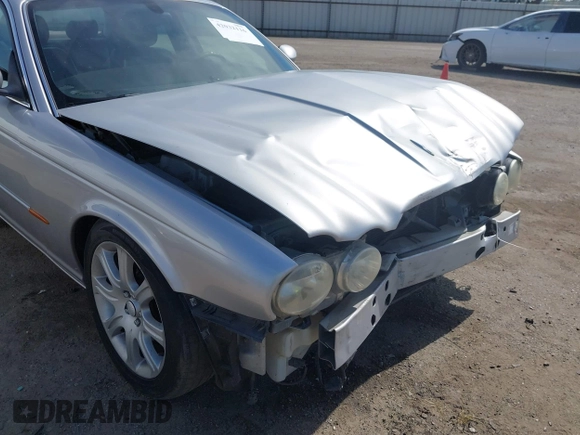 2004 Jaguar XJ 8 with VIN SAJEA71C74SG11470, listed as a IAAI auction lot 42032116 with 209,821 mi miles and . Bid and sale history available at DreamBid. Image 19.