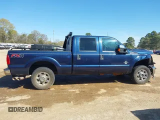 2015 Ford F-250 Lariat z VIN 1FT7W2BT2FEA96337, wystawiony jako IAAI lot #41844938 z przebiegiem 96 851 mil mil oraz . Historia ofert i sprzedaży dostępna na DreamBid. Obrazek 13.