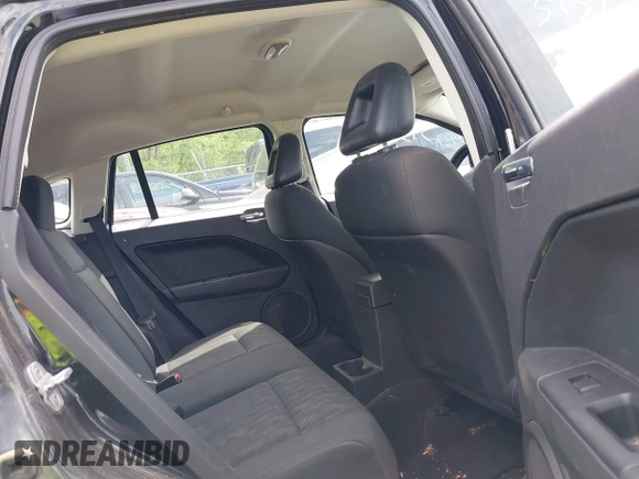 2008 Dodge Caliber SE with VIN 1B3HB28B58D753818, listed as a IAAI auction lot 39373913 with 172,972 mi miles and . Bid and sale history available at DreamBid. Image 8.