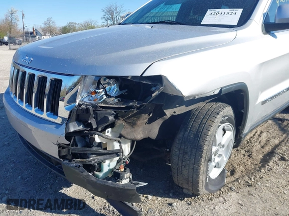 2013 Jeep Grand Cherokee Laredo with VIN 1C4RJFAG3DC586667, listed as a IAAI auction lot 42041524 with 100,635 mi miles. Bid and sale history available at carsss.com. Image 6.