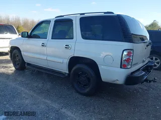 2004 Chevrolet Tahoe LT with VIN 1GNEC13Z54R112847, listed as a IAAI auction lot 41633571 with 234,991 mi miles. Bid and sale history available at carsss.com. Image 3.