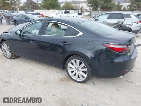 2021 Mazda Mazda6 Touring with VIN JM1GL1VM1M1604566, listed as a IAAI auction lot 41728787 with 68,636 mi miles. Bid and sale history available at carsss.com. Image 3.