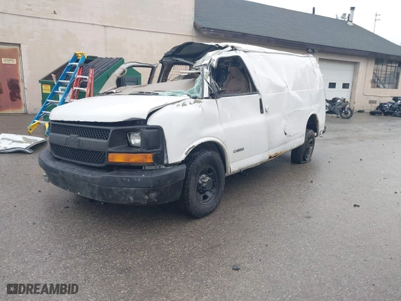 2005 Chevrolet Express Cargo Van with VIN 1GCGG25V051237969, listed as a IAAI auction lot 41163479 with 215,057 mi miles. Bid and sale history available at carsss.com. Image 16.