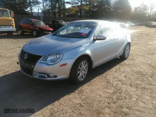 2010 Volkswagen Eos Komfort with VIN WVWBA7AH1AV023634, listed as a IAAI auction lot 40635291 with 42,152 mi miles. Bid and sale history available at carsss.com. Image 2.