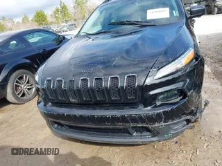 2017 Jeep Cherokee Altitude with VIN 1C4PJLAB7HW660624, listed as a IAAI auction lot 41488683 with 106,963 mi miles and . Bid and sale history available at DreamBid. Image 12.