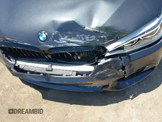 2017 BMW 5 Series 540i z VIN WBAJE5C33HG916941, wystawiony jako IAAI lot #42504534 z przebiegiem 115 127 mil mil oraz . Historia ofert i sprzedaży dostępna na DreamBid. Obrazek 6.