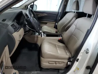 2018 Honda Pilot EX-L with VIN 5FNYF6H58JB040611, listed as a Copart auction lot 63614525 with 148,656 mi miles and Salvage title. Bid and sale history available at DreamBid. Image 7.