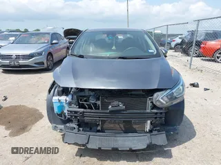 2021 Nissan Versa SV with VIN 3N1CN8EV1ML840835, listed as a IAAI auction lot 42128883 with 77,204 mi miles and . Bid and sale history available at DreamBid. Image 13.