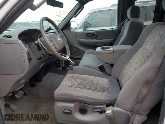 2003 Ford F-150 XL with VIN 1FTRX17L53NB90331, listed as a Copart auction lot 76686124 with 0 mi miles and Salvage Title. Bid and sale history available at carsss.com. Image 7.