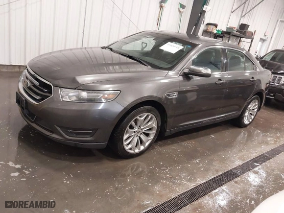 2015 Ford Taurus Limited with VIN 1FAHP2F87FG136199, listed as a IAAI auction lot 41920715 with 173,445 mi miles. Bid and sale history available at carsss.com. Image 2.
