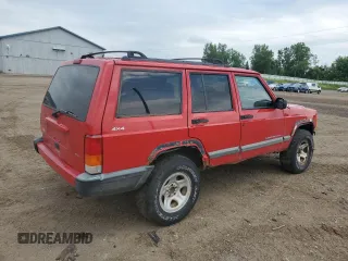 1999 Jeep Cherokee Sport with VIN 1J4FF68S4XL580048, listed as a Copart auction lot 62546365 with 154,059 mi miles and Clean title. Bid and sale history available at DreamBid. Image 3.