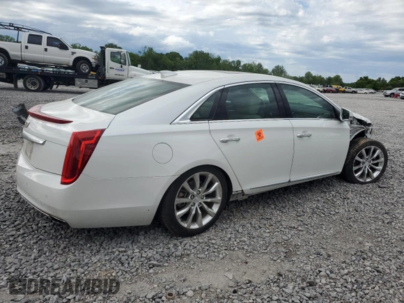 2016 Cadillac XTS Luxury Collection with VIN 2G61M5S34G9209483, listed as a Copart auction lot 54611105 with 23,778 mi miles and Salvage title. Bid and sale history available at DreamBid. Image 3.