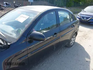 2009 Hyundai Accent Auto GLS z VIN KMHCN46C39U334712, wystawiony jako IAAI lot #42334874 z przebiegiem 193 090 mil mil oraz . Historia ofert i sprzedaży dostępna na DreamBid. Obrazek 6.