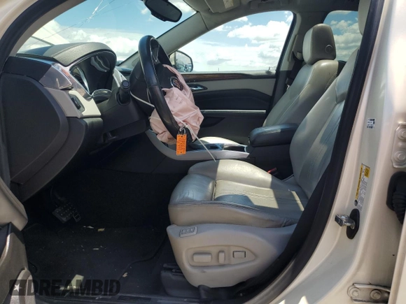 2013 Cadillac SRX Premium Collection with VIN 3GYFNJE39DS600237, listed as a Copart auction lot 56435535 with 138,635 mi miles and Salvage title. Bid and sale history available at DreamBid. Image 7.