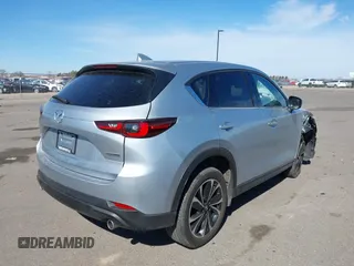 2023 Mazda CX-5 2.5 S Premium Package with VIN JM3KFBDM9P0173453, listed as a IAAI auction lot 41807979 with 34,156 mi miles. Bid and sale history available at carsss.com. Image 4.