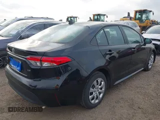 2023 Toyota Corolla LE with VIN 5YFB4MDE0PP067417, listed as a IAAI auction lot 42144017 with 51,652 mi miles. Bid and sale history available at carsss.com. Image 4.