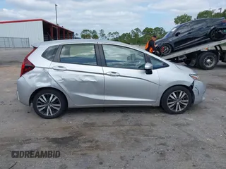 2016 Honda Fit EX with VIN JHMGK5H74GX000882, listed as a IAAI auction lot 42091641 with 64,210 mi miles and . Bid and sale history available at carsss.com. Image 13.
