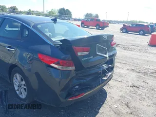2016 Kia Optima LX with VIN KNAGT4L3XG5078248, listed as a IAAI auction lot 42011616 with 150,000 mi miles. Bid and sale history available at carsss.com. Image 6.