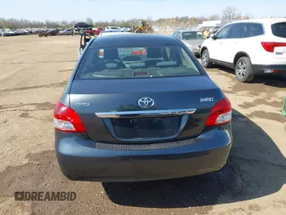 2009 Toyota Yaris with VIN JTDBT903194047784, listed as a IAAI auction lot 42049872 with 115,735 mi miles. Bid and sale history available at carsss.com. Image 16.