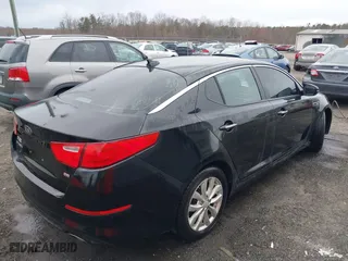 2015 Kia Optima LX with VIN 5XXGM4A79FG442899, listed as a IAAI auction lot 41859111 with 169,130 mi miles. Bid and sale history available at carsss.com. Image 4.