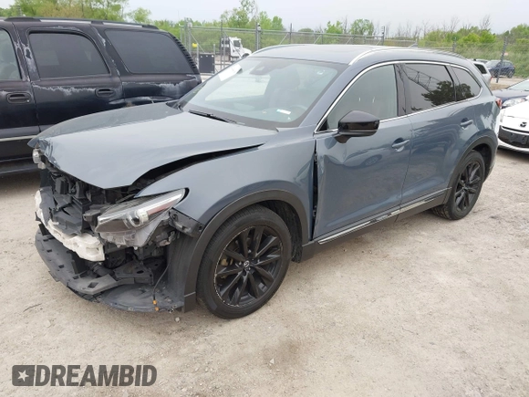 2023 Mazda CX-9 Grand Touring with VIN JM3TCBDY2P0636226, listed as a IAAI auction lot 42384360 with 161,352 mi miles and . Bid and sale history available at DreamBid. Image 2.