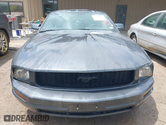 2007 Ford Mustang Deluxe z VIN 1ZVFT80N375329801, wystawiony jako IAAI lot #42198968 z przebiegiem 185 760 mil mil oraz . Historia ofert i sprzedaży dostępna na DreamBid. Obrazek 6.
