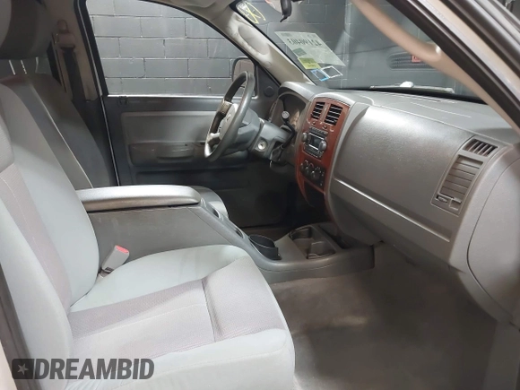 2005 Dodge Dakota SLT with VIN 1D7HW48N15S164352, listed as a IAAI auction lot 42190403 with 150,794 mi miles. Bid and sale history available at carsss.com. Image 5.