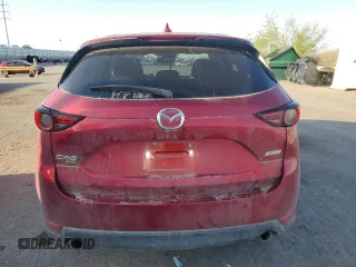 2018 Mazda CX-5 Grand Touring z VIN JM3KFBDMXJ0390680, wystawiony jako Copart lot #51654345 z przebiegiem 67 167 mil mil oraz Szkoda całkowita • Salvage title. Historia ofert i sprzedaży dostępna na DreamBid. Obrazek 6.