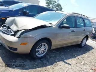 2007 Ford Focus SE z VIN 1FAFP36N77W130848, wystawiony jako IAAI lot #41986099 z przebiegiem 65 649 mil mil oraz . Historia ofert i sprzedaży dostępna na DreamBid. Obrazek 2.