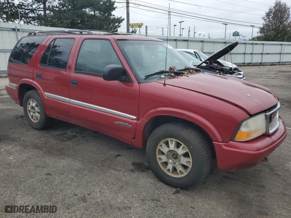 1999 GMC Jimmy SLE with VIN 1GKDT13W3X2546163, listed as a Copart auction lot 79842734 with 144,800 mi miles and Salvage Title. Bid and sale history available at carsss.com. Image 4.