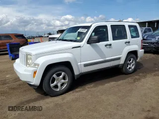2012 Jeep Liberty Sport z VIN 1C4PJMAK7CW135321, wystawiony jako Copart lot #60265205 z przebiegiem 129 848 mil mil oraz Czysty tytuł • Clean title. Historia ofert i sprzedaży dostępna na DreamBid. Obrazek 1.