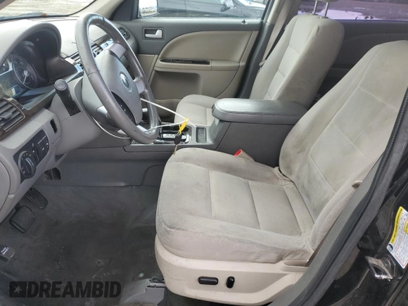 2009 Mercury Sable with VIN 1MEHM40W19G633435, listed as a Copart auction lot 49274275 with 172,223 mi miles and Salvage title. Bid and sale history available at DreamBid. Image 7.